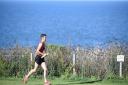 Ben Collinson on the 1st leg of the Round Norfolk Relay in Old Hunstanton. Picture: Ian Burt