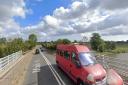 A crash outside a popular village pub has left a car in a ditch