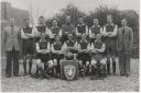 Beeston footballers and officials  on parade with the North Norfolk Cup and Necton Shield at end of their successful 1947 – 48 campaign, ( Photo – Keith Skipper Collection).