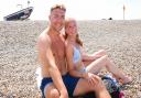 Alice Hardy and her partner, Byron van Uden enjoying the hot weather at Weybourne beach near Holt as a heatwave hits Norfolk.