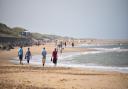 Holidaymakers enjoy the warm weather at Sea Palling beach  Picture : ANTONY KELLY