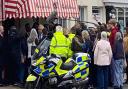 Sir Kenneth Branagh, filming a scene for the political drama This Sceptred Isle, in character as prime minister Boris Johnson coming out of Coxford's Butchers in Aylsham's Market Place.