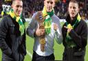 Liam Walsh, middle, and his brothers Ryan, left, and Michael at Carrow Road - but will they be back soon? Picture: PAUL CHESTERTON