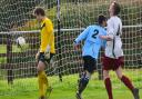 Anglian Combination Division One action between Bungay Town (blue) and Hempnall.