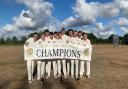 Sheringham Cricket Club's first team celebrating winning the league at Beccles