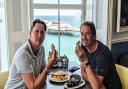 Owners Spencer Gray and Galton Blackiston enjoying fish and chips at Upstairs at No1 Cromer