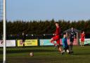 Jamie Smith opening the scoring for Sheringham FC in their clash against the UEA in Dereham.