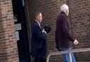 Richard Lane (left) leaving Norwich Crown Court