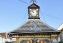 The cast of Snow White, who will take to the stage at Sheringham Little Theatre in December, at the town's clock tower.