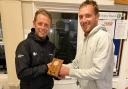 Richard Keeble (left) receiving his winner's trophy from the club's General manager and 2018 club champion Matthew Jordan