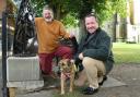 Berni Marfleet and Rev David Warner with dog Buddy at the site of the new sculptures