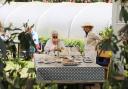 A charity serving cakes and scones at an open day at Stody Lodge Gardens.