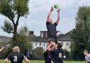 Holt Rugby Football Club's first team in action against Woodford