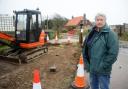 Happisburgh's Bryony Nierop-Reading, known as Granny Canute, has sacrificed another chunk of her garden to the district council to save the village’s clifftop Beach Road car park from being cut-off by erosion