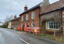 The damaged house in The Street in Thornage