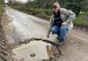 Angry villagers in Dilham want the council to pay for the damage potholes have caused to their vehicles - which could cost Roy Jones £2,000 for a new set of tyres