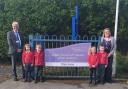 Swallowtail Federation joins St Benet's MAT from Left Richard Cranmer CEO of St Benet's MAT,  Mrs Natatlie Butcher Executive Headteacher and children