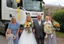 Bride and groom Sarah and James Moore, with son Matthew, mum Julie Waller, grandad David Waller, and daughter Bella.