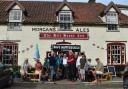 Save Happisburgh campaigners outside the Hill House Inn.