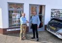 Mark Nolan, managing director of Chaplin Farrant, and Ian Mutton, chairman of SMG Architects, shaking hands outside SMG Architects office in Sheringham