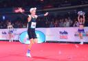 Logan Smith celebrates his new PB on the home straight of the Frankfurt Marathon