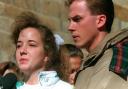 Susan and David Smith addressing reporters in 1994 (Mary Ann Chastain/AP)