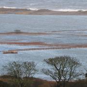 Cley (pictured) is one of the coastal areas where a flood warning has been issued