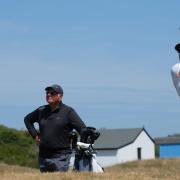 Amelia Williamson watched by caddie Gary Brayshaw