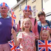 (L-R) Edward Robinson, Alan Mann, Aurelia Robinson, Elenor Robinson, Lilana Robinson and Gwen Mann celebrating the Queen Platinum Jubilee in Holt.