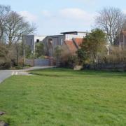 A view towards Arcady from the village green in Cley.