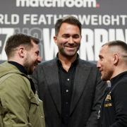 Maxi Hughes and Ryan Walsh, right, come face to face at a press conference to announce their world title clash, with Matchroom boss Eddie Hearn watching on