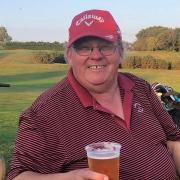 Donald Stuart enjoying a pint at the 19th hole at Mundesley Golf Club. A trophy has now been named after the inspirational former chairman of Mundesley Golf Club.