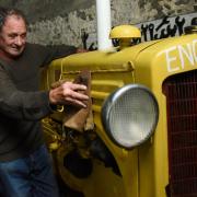 Jack Hammond with a Minneapolis Moline tractor, part of the collection amassed by his late father Billy Hammond at Aldborough