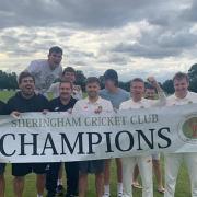 Sheringham Cricket Club's first team celebrate after wrapping up the league title against Swardeston CEYMS