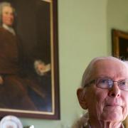 Mannington Hall Gardening Feature with Lord and Lady Walpole. Lord Robin Walpole in front of a portrait of Horatio Walpole. 

Picture: MARK BULLIMORE