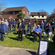 Men's shed members gathered at the Grange care home on Saturday to watch the official ribbon-cutting by local MP Duncan Baker.