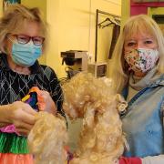 Costume team Libby Henshaw and Jenni Randall checking out the panto 'dressing up' box at Sheringham Little Theatre ahead of rehearsals for Rapunzel.