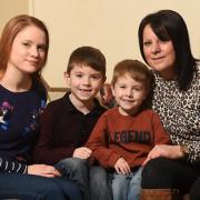 Alfie Oswick, 8, is raising money for Dereham Cancer Care. Pictured with his mum, Jennifer, grandmother Amanda Owen and younger brother Charlie, 4.
Picture: ANTONY KELLY