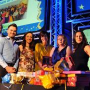 The EDP Stars of Norfolk awards. Winners of the Team of the Year Award from BEAT, presented by Tom Fitzpatrick, left, and a special gift presented by Sheila Oxtoby, right. Picture: DENISE BRADLEY