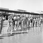 A glimpse of seventies seaside fun as these children take part in a beach sports event on July 31, 1973.