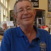 Chris Beckett, who has died aged 67, at the North Norfolk Railway in Sheringham wearing his Men's Shed t-shirt - Picture: Courtesy of family