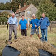 Taking part in the Great British Rake Off at Cley Church were, from left, Richard Jefferson, Nick Besant, Wyatt Earp, Klausbernd Vollmar