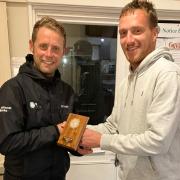 Richard Keeble (left) receiving his winner's trophy from the club's General manager and 2018 club champion Matthew Jordan