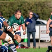 Mark McCall of North Walsham Vikings rugby club breaks through the defence in Westcombe Park match