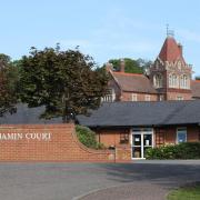 A major public meeting on the future use of the former Benjamin Court hospital aftercare building in Cromer, north Norfolk, has been postponed