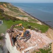 The rubble from an 18th century farmhouse demolished on the cliffs at Trimingham on the north Norfolk coast has been cleared