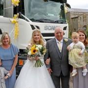 Bride and groom Sarah and James Moore, with son Matthew, mum Julie Waller, grandad David Waller, and daughter Bella.