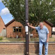 Chris Wright and the pole in question