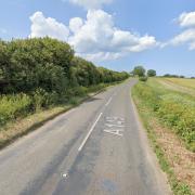 Coast Road in Holt has been closed following a crash