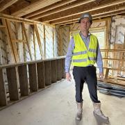 Flagship Homes Senior Project Manager Peter Waplington inside one of the homes which are being built off Weybourne Road in Sheringham